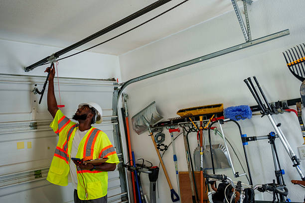 Professional Garage Door Spring Repair technician working in State College, PA